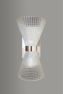  Wall-mounted light fixture with textured glass shade on a gray background. Polished Stainless Steel.