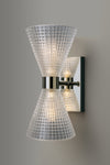 Wall-mounted polished stainless steel light fixture with glass shades on a gray background