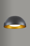 Modern pendant light with black exterior and gold interior on a gray background