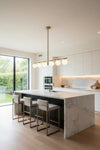 Modern kitchen with marble island and LED Satin brass pendant light