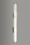 Wall-mounted LED alabaster satin brass light fixture with cylindrical design on a gray background