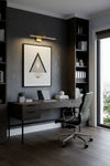 Modern home office with dark gray walls, a desk, chair, and decor. LED wall sconce, plug-in or hardwire.
