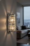 Modern wall sconce in a living room with a cityscape view