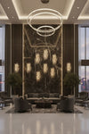 Luxury lobby with modern furniture and decorative crystal and glass polished stainless steel LED wall lights