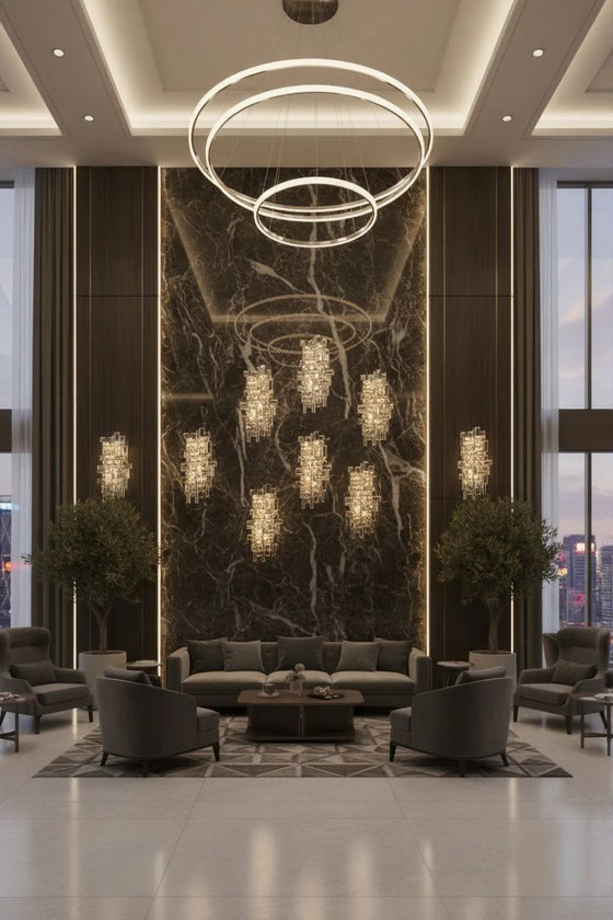 Luxury lobby with modern furniture and decorative crystal and glass polished stainless steel LED wall lights