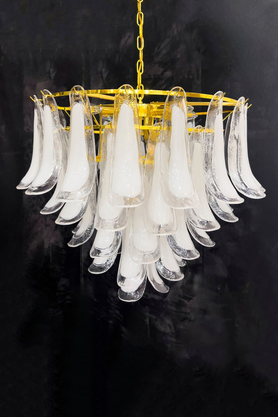 A mid century petal chandelier with clear and white glass accents and a gold frame, designed for ceiling mounting.