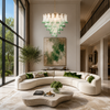 Modern living room with a curved white sofa, decorative pillows, and a stylish chandelier.