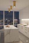 Downlight Satin Brass Modern kitchen with marble island and city skyline view