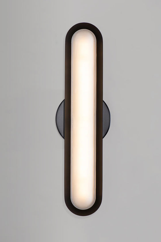 Black sconce Modern wall-mounted light fixture on a gray background