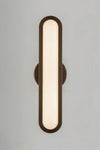 Wall-mounted light fixture with a brown frame and white interior on a gray background