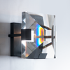Side view of the Ann Arbour Glass Wall Sconce with a prism effect displayed in the glass