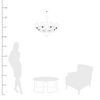 Fairmont Chrome Chandelier with Ribbed Glass Arm shown to scale with a side table, chair and person
