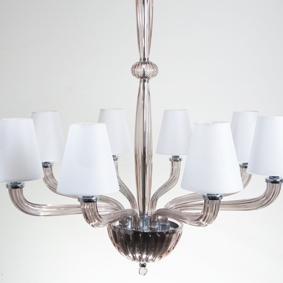 Close up of the candelabra  base of the Fairmont Chrome Chandelier with Ribbed Glass Arm