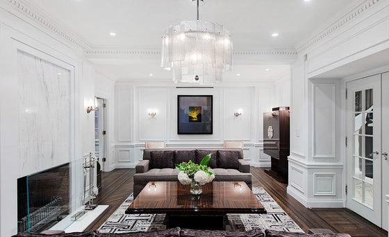 Galjour Murano Glass Chandelier shown installed over a table in a living room setting
