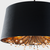View of detail of Isla Chandelier showing the gold foil interior of the black silk shade