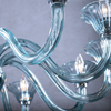 Close up of blue glass arms and LED bulbs of Marcella Blue Glass Chandelier