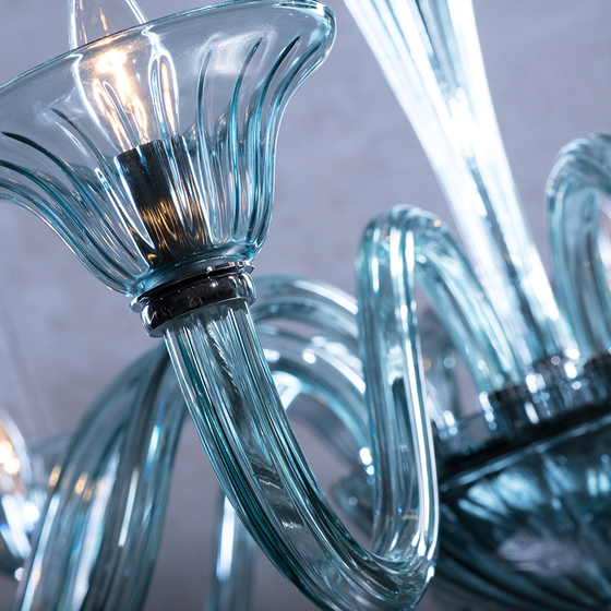 Close up of blue glass arms and LED bulbs of Marcella Blue Glass Chandelier