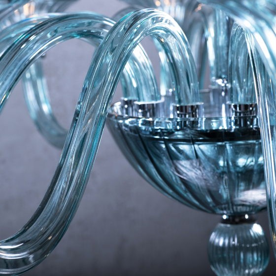 Close up of blue glass arms of Marcella Blue Glass Chandelier
