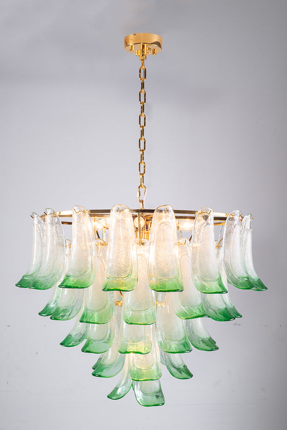 A mid century petal chandelier with clear and green glass accents and a gold frame, designed for ceiling mounting.