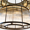 Detailed view of 2 tiered glass shades of the Valen Antique Black Round Chandelier