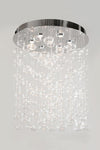 A contemporary silver flush LED ceiling mount chandelier with clear glass bubble decorations.
