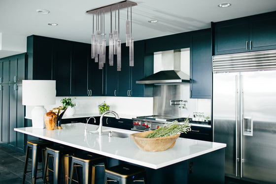 Angled Side view of the Eden Multi Spot Glass Pendant installed over a kitchen island