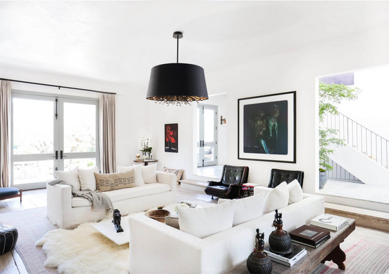 Isla Black Silk Shade Chandelier shown installed in a white living room setting