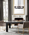 Talin Round Chandelier in acid metal black shown installed over a dining room table