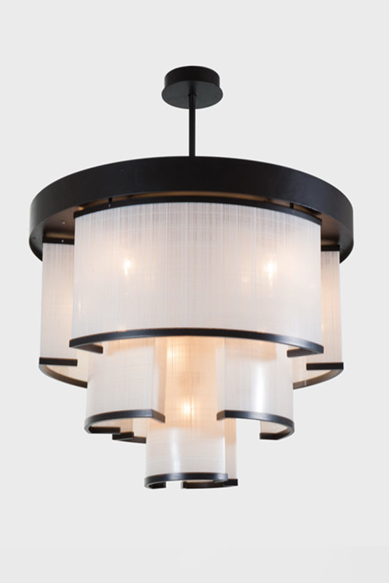 A contemporary black finish chandelier with faux linen fabric shades, featuring a multi-tiered design and LED lights.